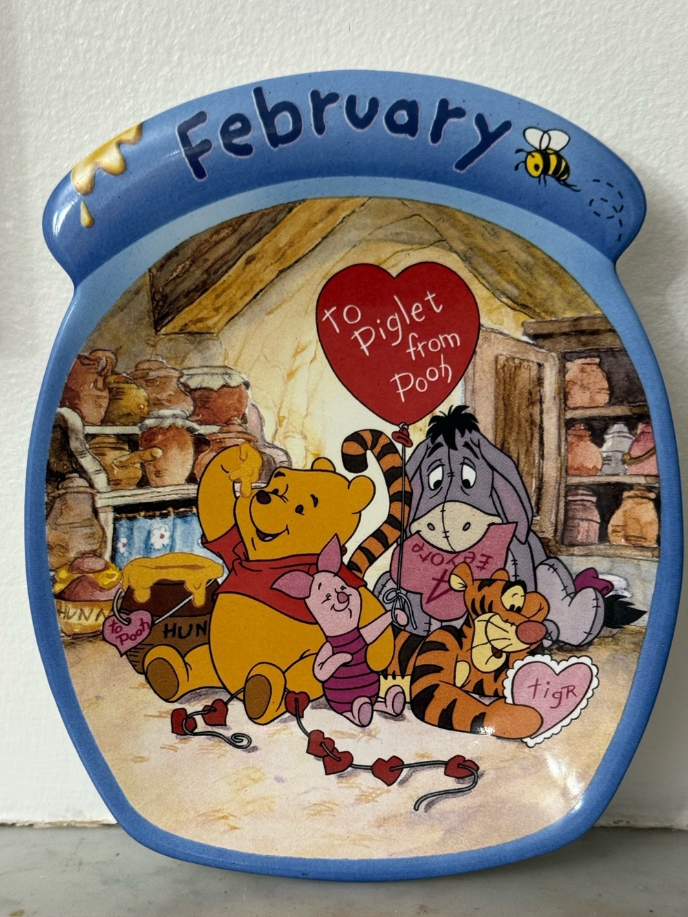 Disney's Winnie the Pooh the whole year through Calendar plate February